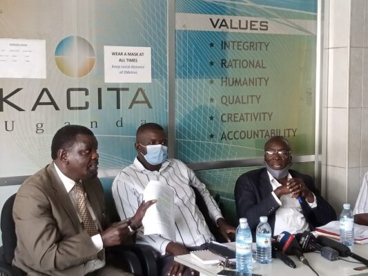 Issa Ssekitto KACITA Uganda Spokesperson (R) with Mr Thadias Musoke the General Secretary KACITA Uganda (C) and Mr Jjemba Mulondo (L) a